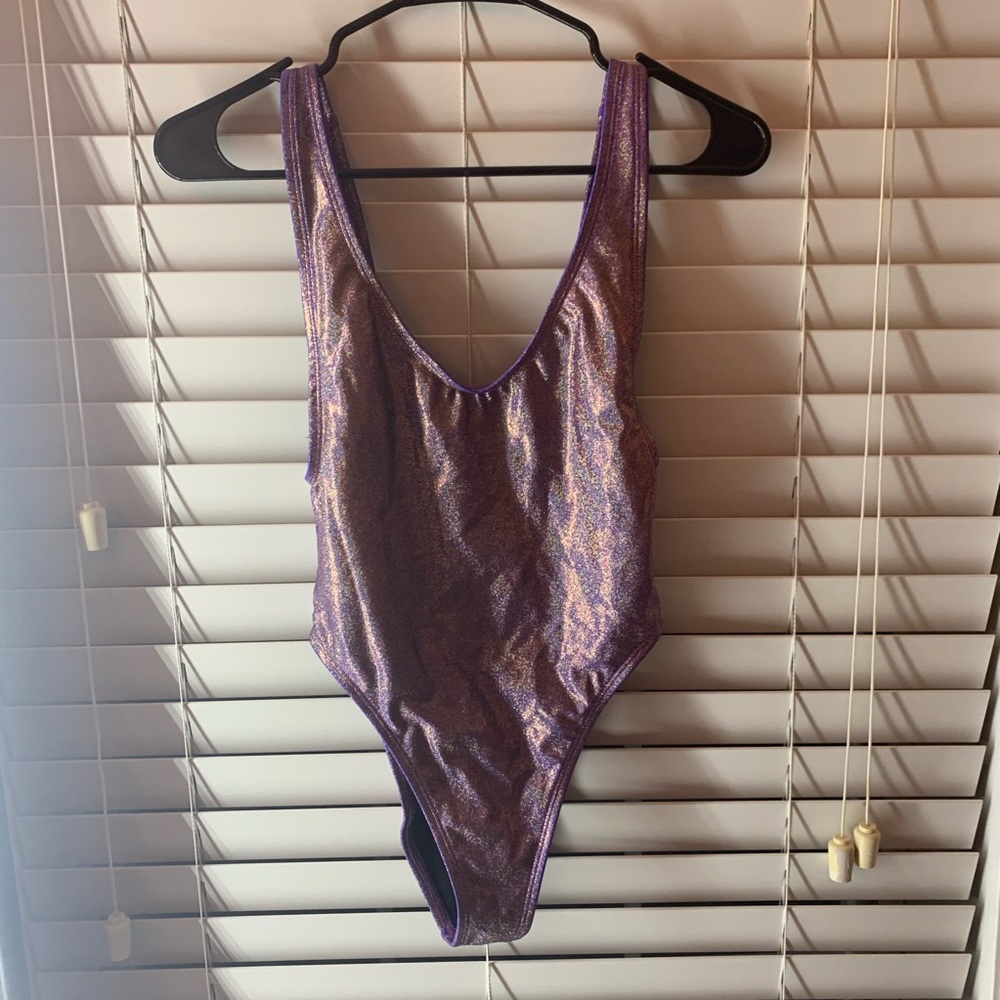 Purple holographic bodysuit from dolls kill
